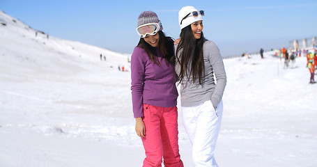 Image showing Two attractive women friends at a ski resort
