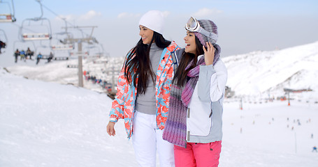 Image showing Two pretty young female friends at a ski resort