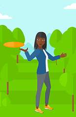 Image showing Woman playing frisbee.