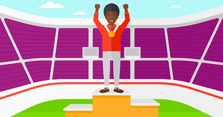 Image showing Athlete with medal and hands raised.