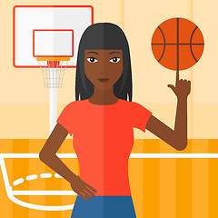 Image showing Basketball player spinning ball.