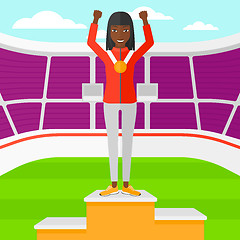 Image showing Athlete with medal and hands raised.