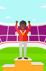 Image showing Athlete with medal and hands raised.