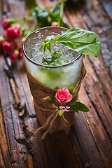 Image showing fresh mojito on a rustic table