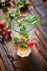 Image showing fresh mojito on a rustic table