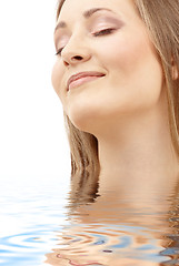 Image showing bright picture of smiling woman in water