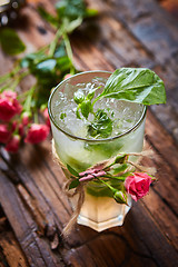 Image showing fresh mojito on a rustic table