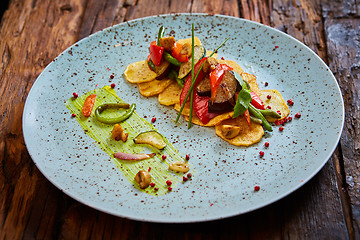 Image showing Potato Chips with sweet pepper, aubergine and asparagus. 