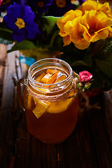Image showing Ginger tea with orange, spices and honey.