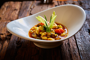 Image showing Baked beans in tomato sauce on plate