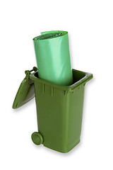 Image showing Garbage can with green trash bags