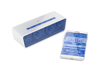 Image showing Smartphone and portable speaker