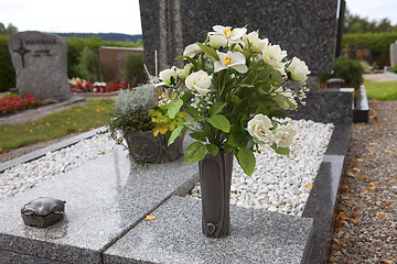 Image showing Flowers for grave decoration