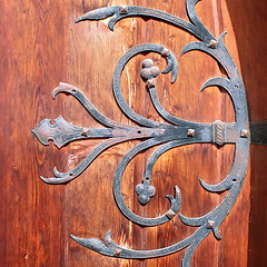 Image showing detail of metallic handmade work on old door