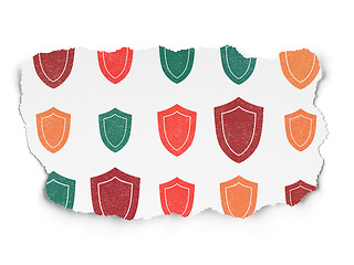 Image showing Safety concept: Shield icons on Torn Paper background