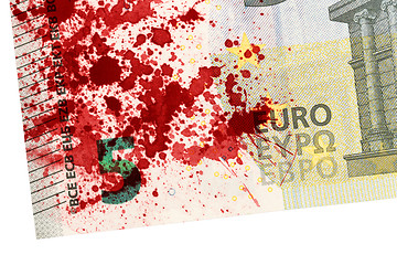 Image showing Close-up of a 5 euro bank note, stained with blood