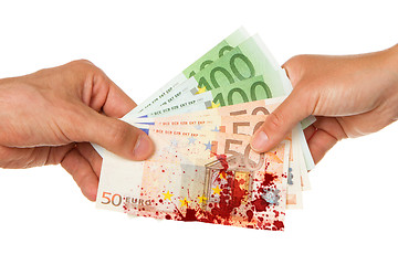 Image showing Man giving 450 euro to a woman, bloody