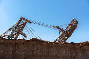 Image showing Large excavator machine in the mine