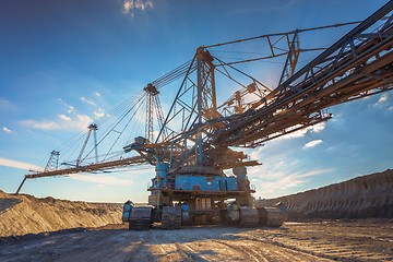 Image showing Large excavator machine in the mine