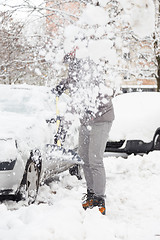 Image showing Man shoveling snow in winter.