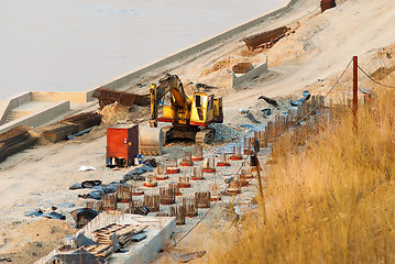 Image showing Excavator on pedestrian quay construction. Tyumen