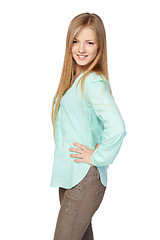 Image showing Blond female in mint color shirt