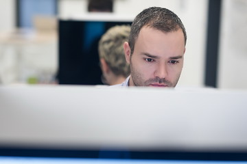 Image showing startup business, software developer working on desktop computer