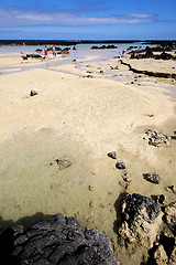 Image showing people spain    spiral of black rocks in the   lanzarote 