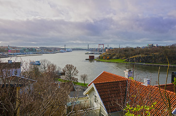 Image showing Gothenburg harbour with the river and the boat