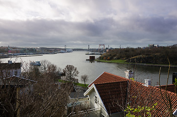 Image showing Gothenburg harbour with the river and the boat