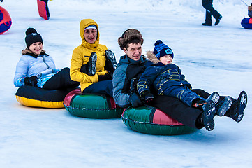 Image showing Baby winter sledding on the Ural River