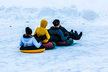 Image showing Baby winter sledding on the Ural River