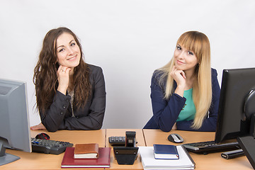 Image showing Two young girls newly recruited developing are in the workplace