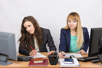 Image showing Two young women working in the office