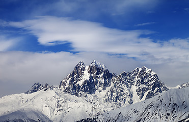 Image showing Mounts Ushba and Chatyn and blue sky with clouds