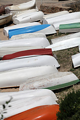 Image showing  pile rowing boats on the shore