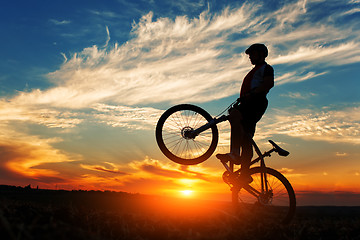 Image showing Silhouette of a man on muontain-bike