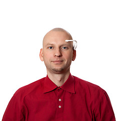 Image showing Portrait of young man with handmade EEG headset on head