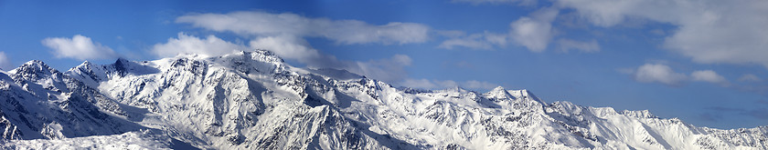 Image showing Large panoramic view on snowy mountains in nice sunny day