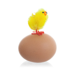 Image showing Easter chicks surrounding a large egg