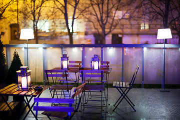 Image showing Illuminated tables in bistro