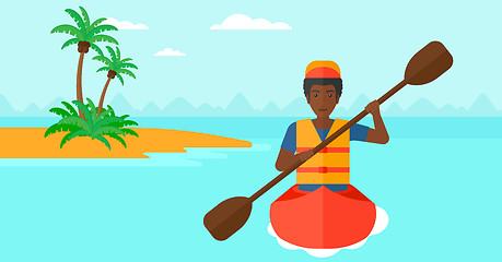 Image showing Man riding in canoe.