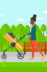 Image showing Woman pushing pram.