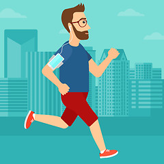 Image showing Man jogging with earphones and smartphone.