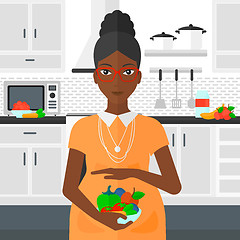 Image showing Pregnant woman with vegetables.