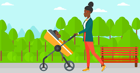 Image showing Woman pushing pram.