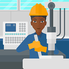 Image showing Woman working with industrial equipment.