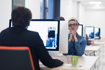 Image showing startup business, woman  working on desktop computer