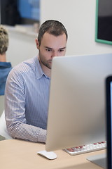 Image showing startup business, software developer working on desktop computer