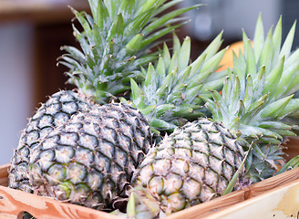 Image showing pineapples in box